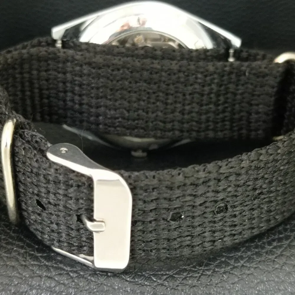 Vintage 1976 Seiko Automatic Mens Silver Watch W/daydate & Black accents